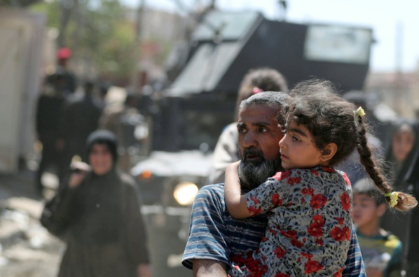 Rescapés in extremis de Mossoul, des déplacés irakiens disent "renaître" Rescapés in extremis de Mossoul, des déplacés irakiens disent "renaître"