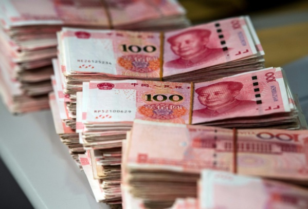 Commerce: la monnaie chinoise chute après les menaces de Trump