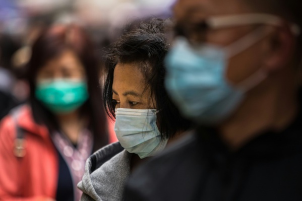 Coronavirus: à la frontière de Hong Kong, des sentiments partagés Coronavirus: à la frontière de Hong Kong, des sentiments partagés