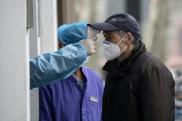 Virus: le bilan explose en Chine après un changement de calcul, des têtes tombent