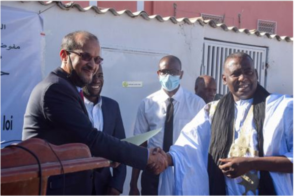 Remise du premier récépissé de reconnaissance conformément aux exigences de la nouvelle loi sur les OSCs Remise du premier récépissé de reconnaissance conformément aux exigences de la nouvelle loi sur les OSCs